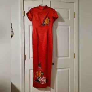 Chinese red full-length lined dress with painted flowers and gold trim. Size 2.